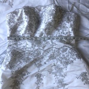 David bridal strapless ballgown wedding dress with long train